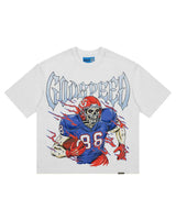 Godspeed Endzone Tee snow white, cotton tee with a skeleton football player in a blue and red kit under chrome Gothic Godspeed lettering, front view