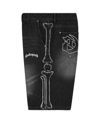 Godspeed Femur Frayed Denim Shorts Black, side view showing the frayed femur bone appliqué running the full seam