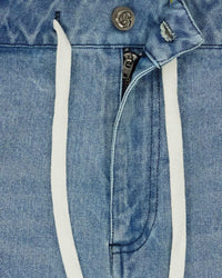 Godspeed Femur Frayed Denim Shorts Blue, close-up of the zipper fly and drawstring waistband