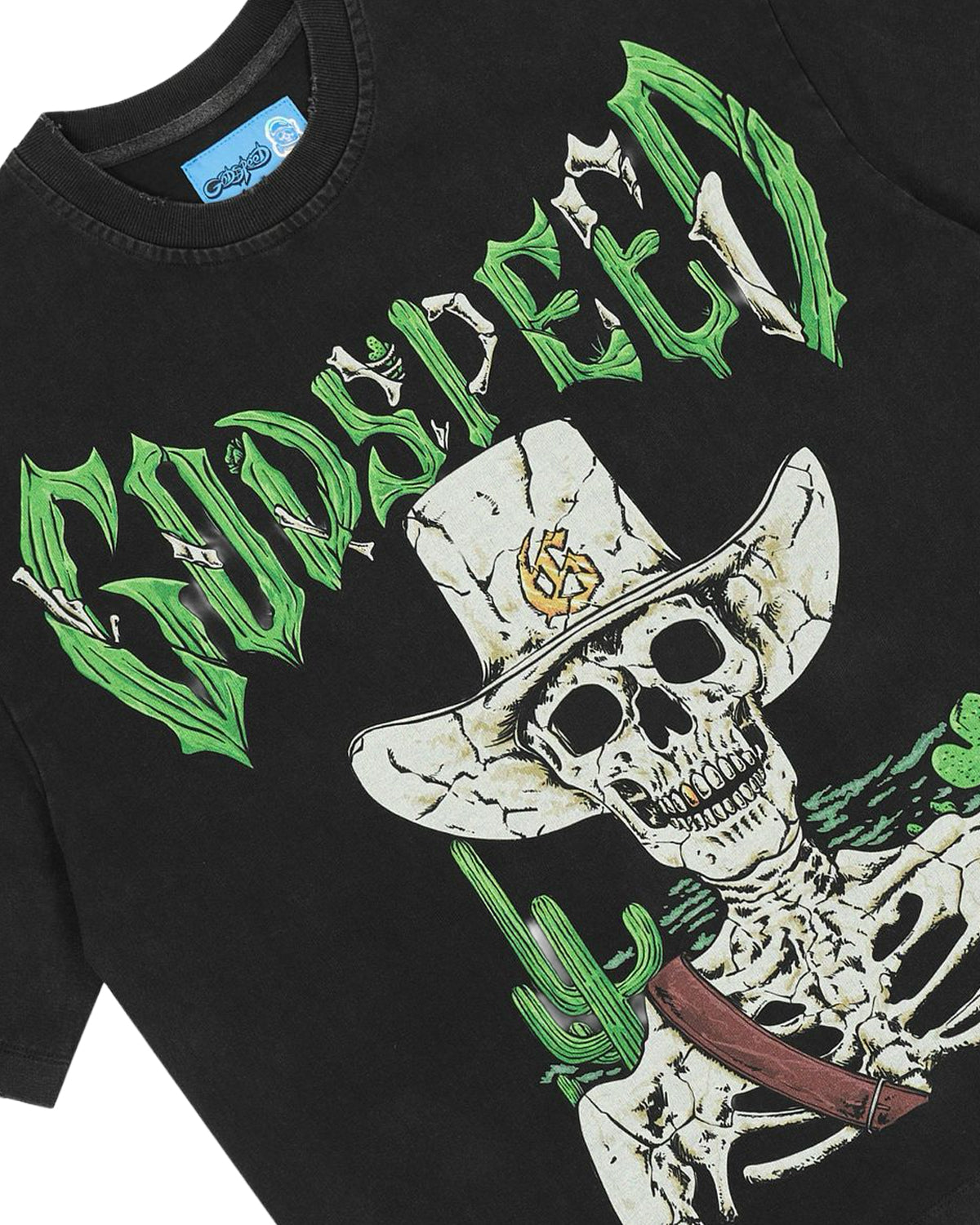 Godspeed Goldie NG Tee black, angled close-up of the skeleton cowboy graphic and green spiked lettering