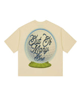 Godspeed Green Reaper Tee bone, back view with large golf ball and Out Of Many One script