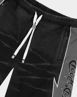 Godspeed Halftime Shorts V2 Black Acid Wash, side view showing the lightning-bolt panel seam and gothic script