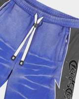 Godspeed Halftime Shorts V2 Blue Acid Wash, side view showing the lightning-bolt panel seam and gothic script