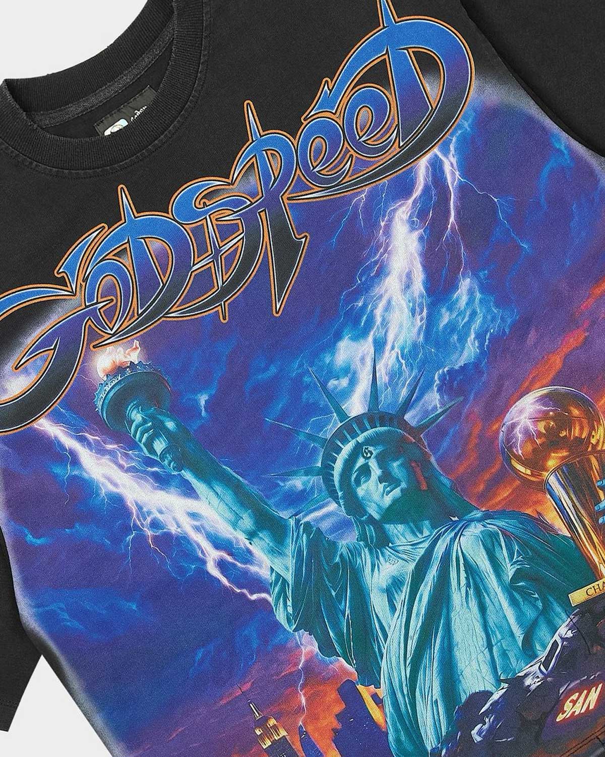 Godspeed Liberty Reigns Tee black, close-up of the chrome-blue Godspeed script and Statue of Liberty graphic
