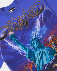Godspeed Liberty Reigns Tee Blue, close-up of the Statue of Liberty and chrome Godspeed print
