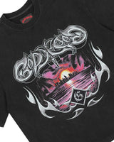Godspeed Liberty Sunset Tee in black, close-up of the chrome tribal Godspeed graphic and sunset skyline