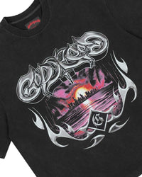 Godspeed Liberty Sunset Tee in black, close-up of the chrome tribal Godspeed graphic and sunset skyline