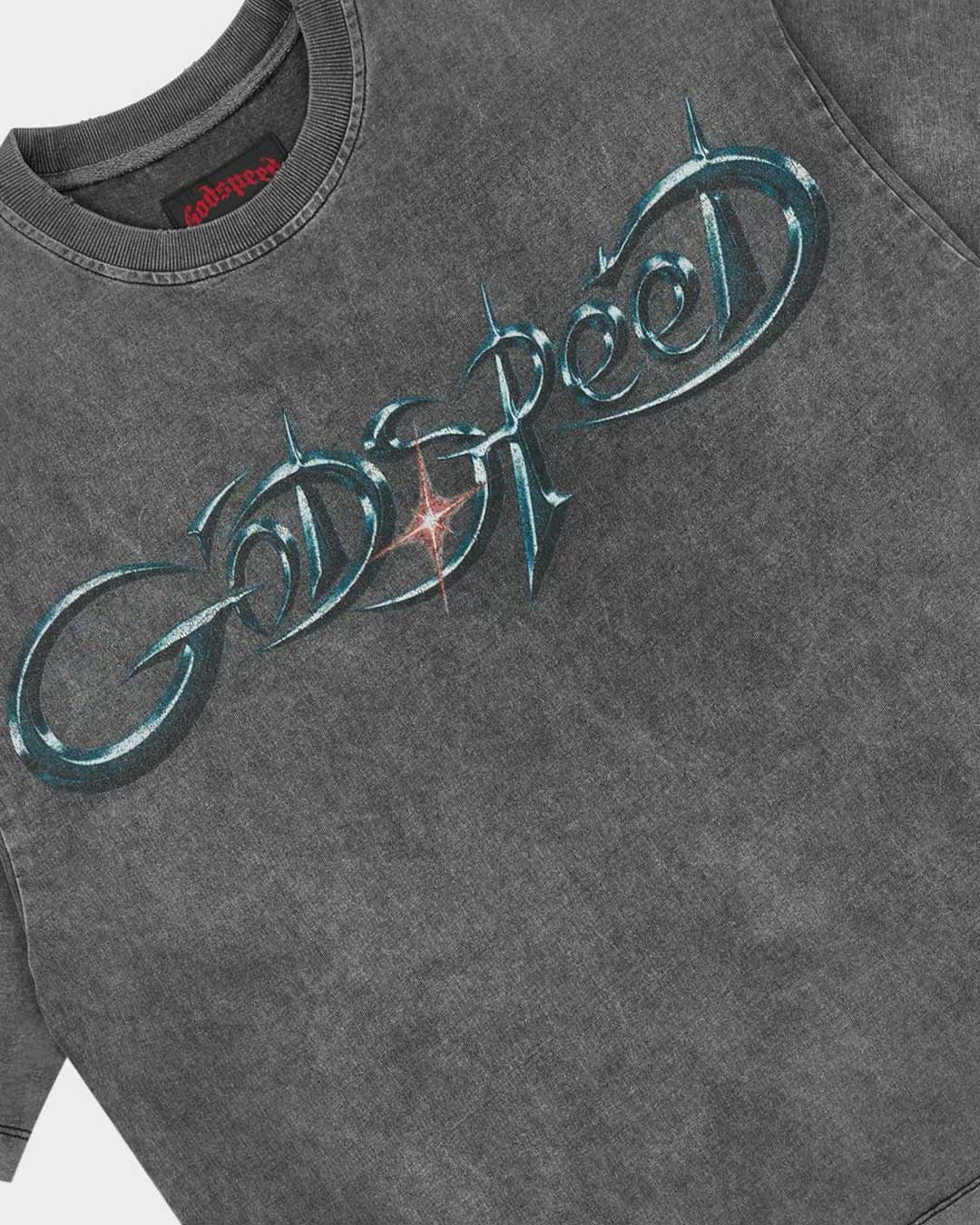 Godspeed New Age Reloaded Tee Grey Wash, angled side view showing the boxy cut and raw hem