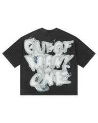 Godspeed No Risk No Reward Tee Black Wash, back view showing the smoked bubble-lettered OUT OF MANY ONE print