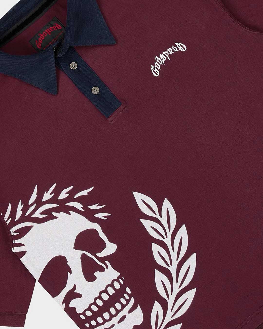 Godspeed Oversized Victor Crest Polo burgundy and navy, close-up of the skull crest and the Godspeed chest script