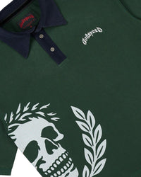 Godspeed Oversized Victor Crest Polo green and navy, close-up of the skull crest and the Godspeed chest script