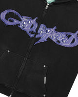 Godspeed Raw Import Sweatsuit black/blue, close-up of the blue-violet graffiti lettering on the hoodie chest