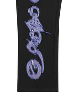 Godspeed Raw Import Sweatsuit black/blue, close-up of the blue-violet graffiti print down the pant leg