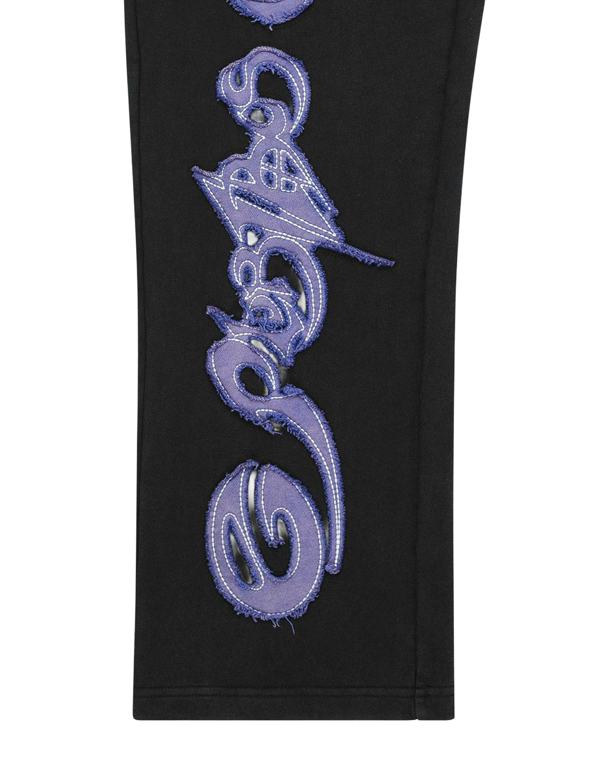 Godspeed Raw Import Sweatsuit black/blue, close-up of the blue-violet graffiti print down the pant leg
