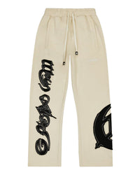 Godspeed Raw Import Sweatsuit bone/black, flared sweatpants front view with black graffiti on the legs
