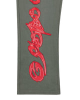 Godspeed Raw Import Sweatsuit grey/red, close-up of the red graffiti print down the pant leg