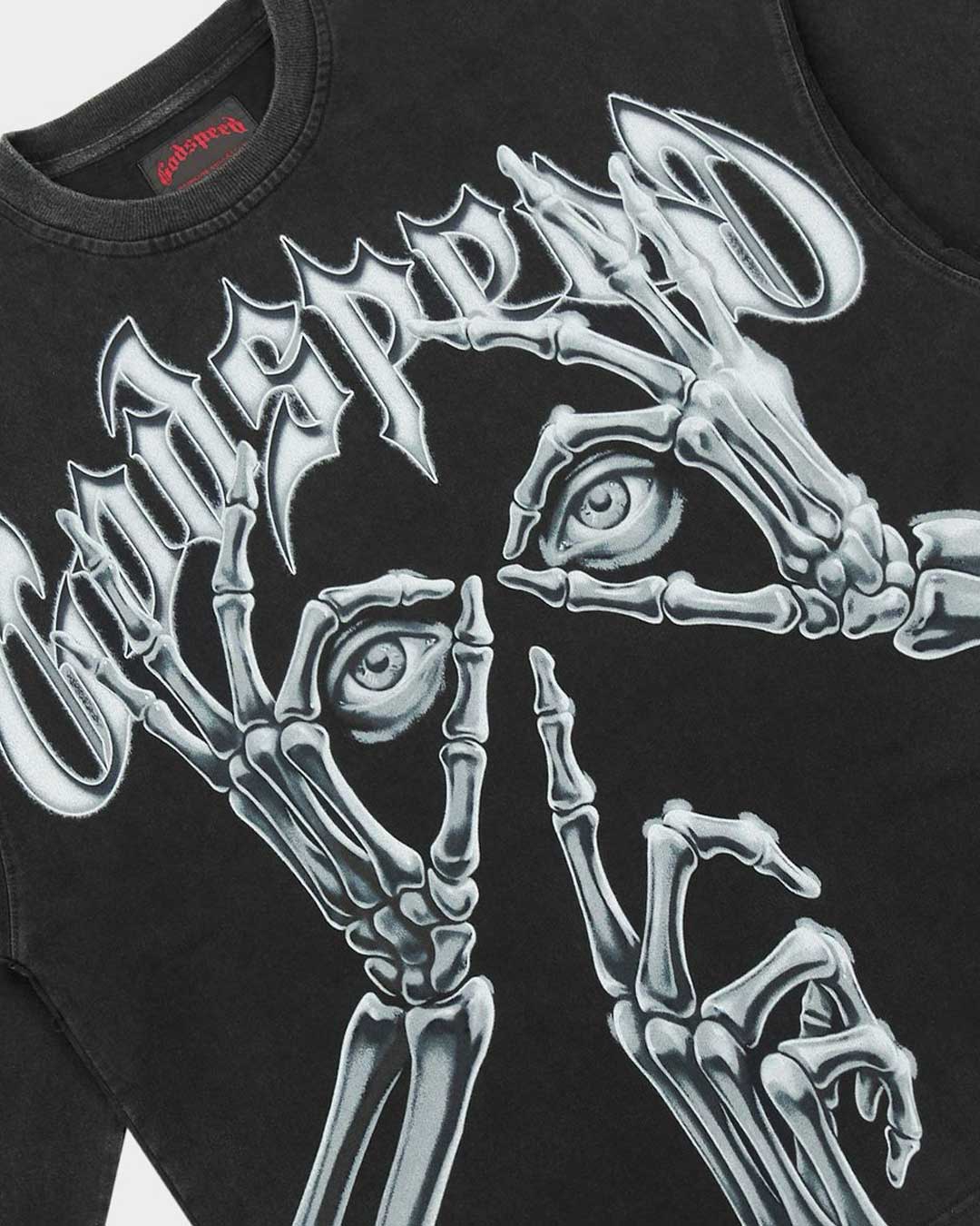 Godspeed Silencio L/S Tee black, close-up of the chrome skeletal hands and Gothic Godspeed lettering