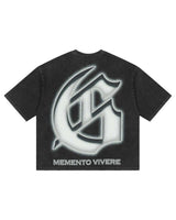 Godspeed Silencio Tee Black Wash, back view showing the glowing gothic G monogram above MEMENTO VIVERE