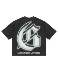 Godspeed Silencio Tee Black Wash, back view showing the glowing gothic G monogram above MEMENTO VIVERE