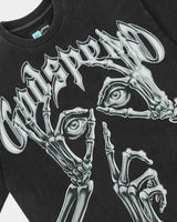 Godspeed Silencio Tee Black Wash, angled side view showing the boxy cut and raw hem