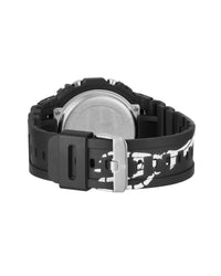 Godspeed Skele Chrono black, hexagonal packaging tin open showing watch in foam insert