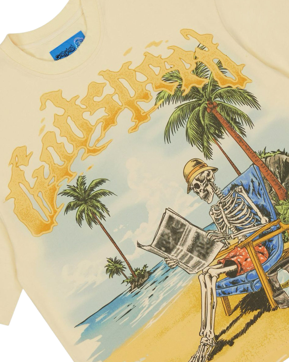 Godspeed Skeleton Beach II NG Tee bone, close-up of the skeleton in a beach chair under golden Godspeed lettering