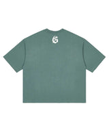 Godspeed Vital Necessi Tee sage smoke, back view with a gothic G monogram at the yoke