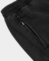 Godspeed Vital Short Set black wash with pink logo, close-up of the zip side pocket