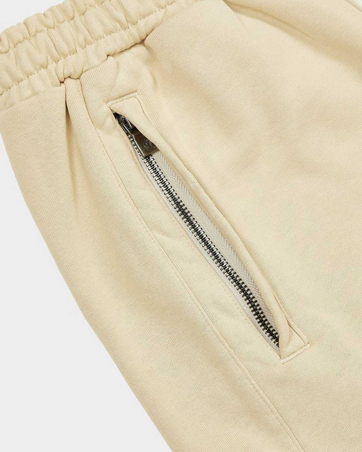 Godspeed Vital Terry Shorts oat milk, close-up of the side pocket and drawstring waist