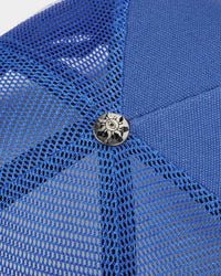 Godspeed x The Legacy Trucker Hat NYK blue/orange/black, close-up of the crown button and mesh panels