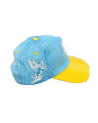 Mixed Emotions ME Hat blue, side view of the distressed blue crown
