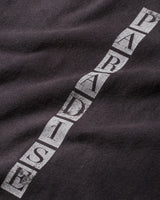 Pieces Closest To Heaven Tee vintage black, close-up of the diagonal PARADISE tile lettering