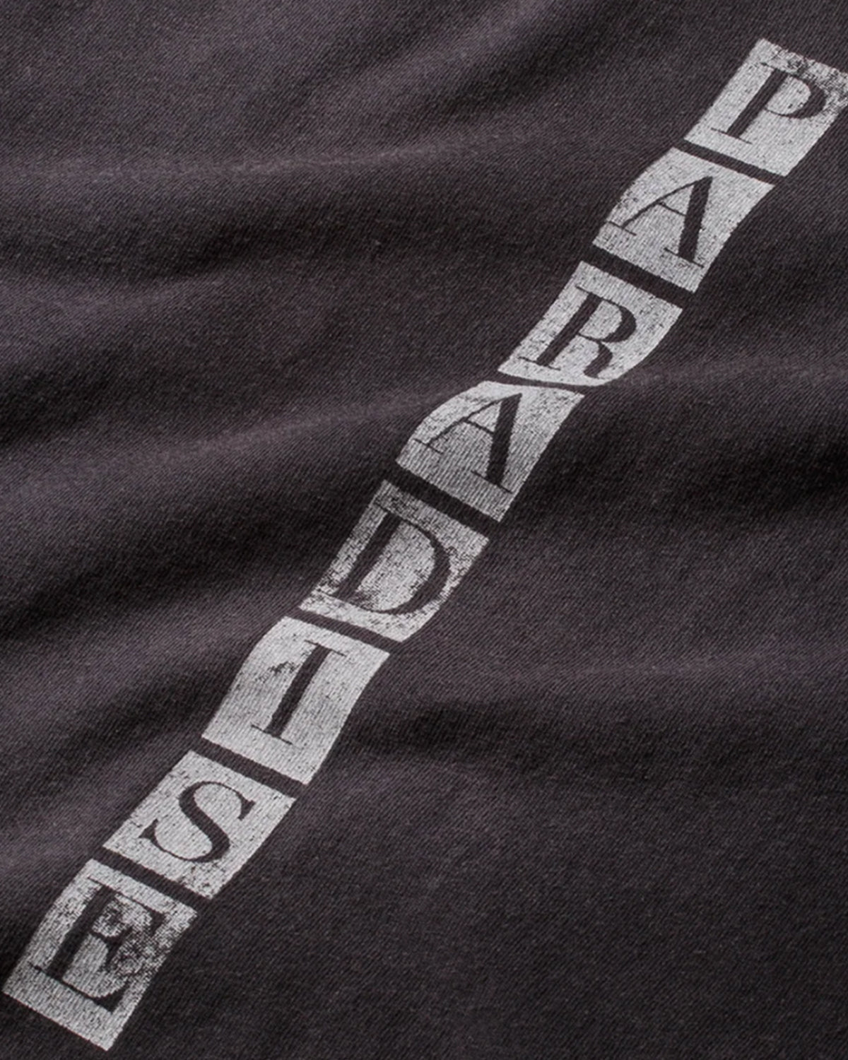 Pieces Closest To Heaven Tee vintage black, close-up of the diagonal PARADISE tile lettering