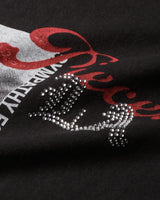 Pieces Sympathy Tee vintage black, close-up of red script and rhinestone lettering