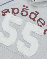Sp5der 55 University Hoodie heather grey, close-up of the burgundy Sp5der lettering and distressed white 55 appliqué