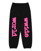 Sp5der Angel Number Beluga Sweatpants black and pink, black fleece joggers with an oversized hot pink puff worldwide wordmark down both legs, front view