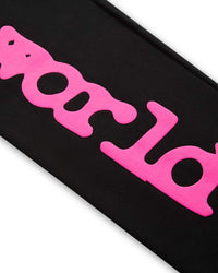Sp5der Angel Number Beluga Sweatpants black and pink, close-up of the pink puff lettering on the left leg