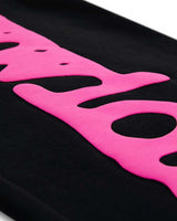 Sp5der Angel Number Beluga Sweatpants black and pink, macro close-up of the raised pink puff print texture
