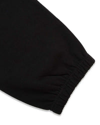 Sp5der Angel Number Beluga Sweatpants black and pink, close-up of the elasticated ankle cuff