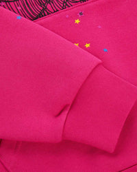 Sp5der Angel Number Hoodie pink, close-up of the ribbed sleeve cuff and scattered star print