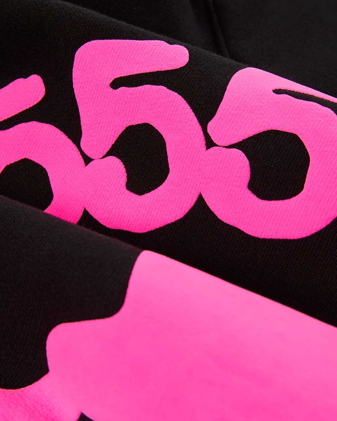 Sp5der Beluga Angel Number Hoodie black and pink, close-up of the hot pink 555 numerals print texture