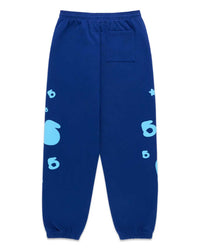 Sp5der Beluga V2 Sweatpants navy/blue, back view with puff 5 and star graphics on the legs
