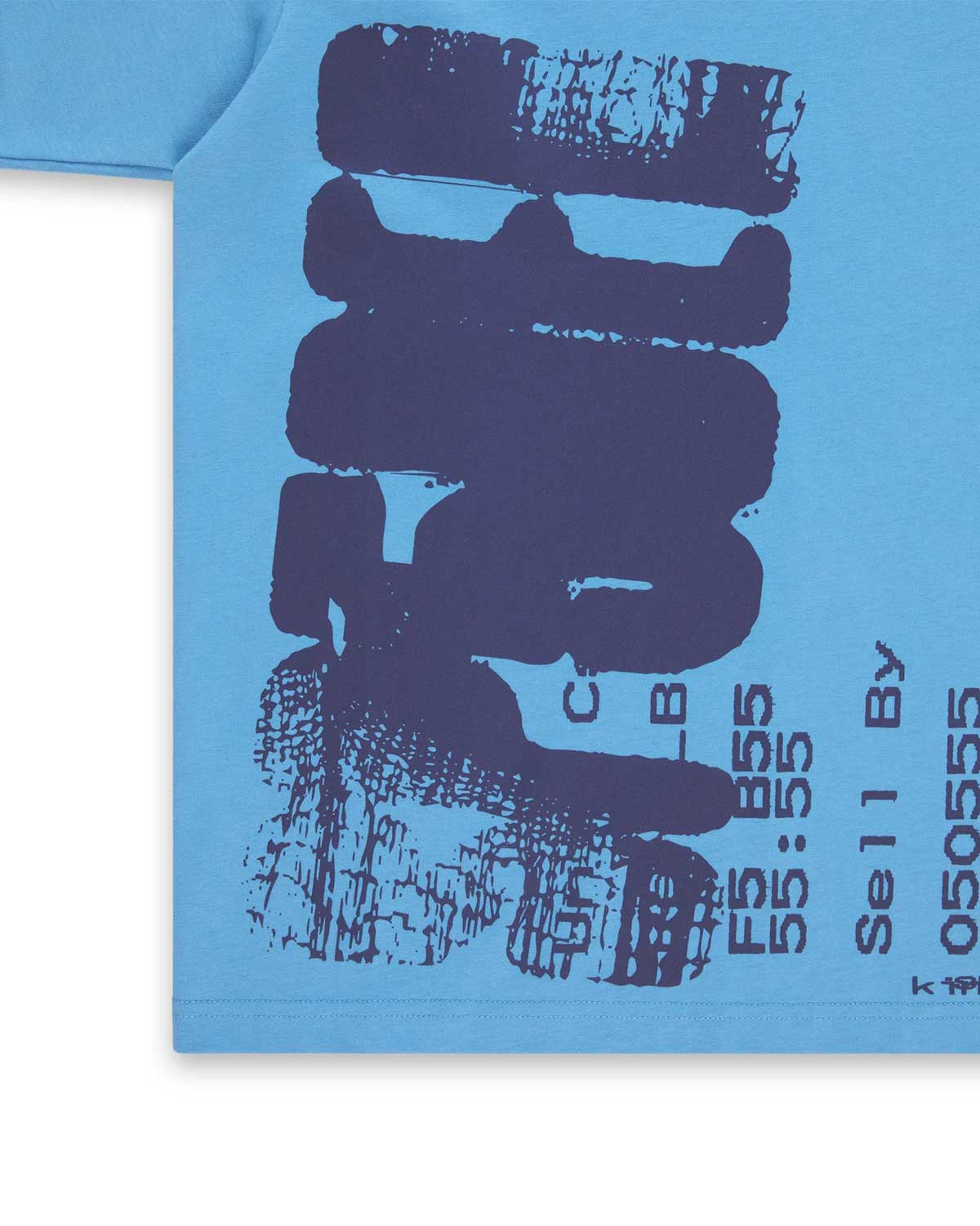 Sp5der Commerce Tee dusty blue, close-up of the commerce ticket graphic on the chest