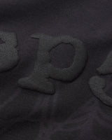 Sp5der Distressed OG Web V2 L/S granite black, close-up of the tonal puff Sp5der lettering