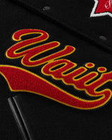 Sp5der District Cuntry Varsity Jacket black, close-up of the red and gold Waiit chenille script patch