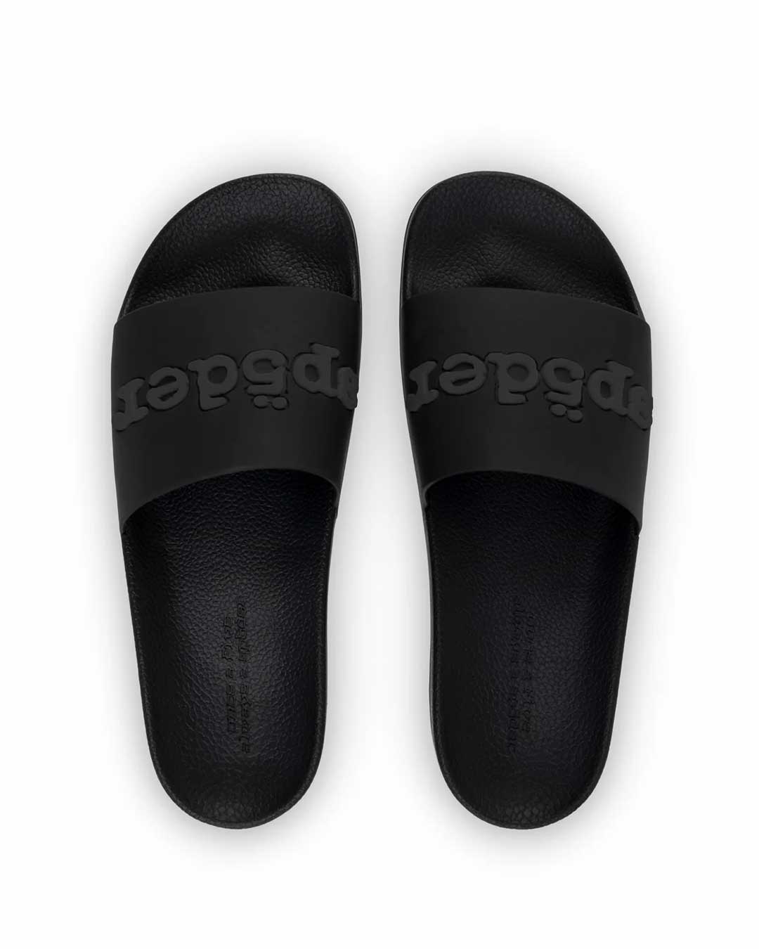 Sp5der Enzo Slide black, top-down view of the pair showing the Sp5der logo straps