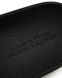 Sp5der Enzo Slide black, close-up of the debossed message on the footbed