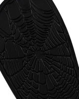 Sp5der Enzo Slide black, close-up of the spiderweb-textured footbed
