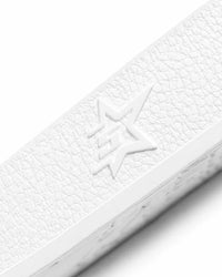 Sp5der Enzo Slide white, close-up of the embossed star on the side of the strap