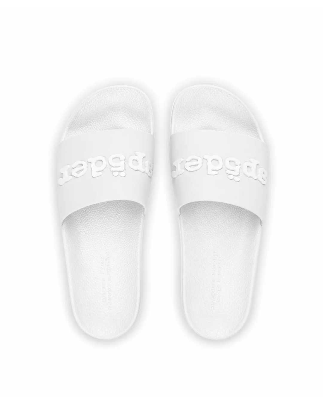 Sp5der Enzo Slide white, top-down view of the pair showing the Sp5der logo straps